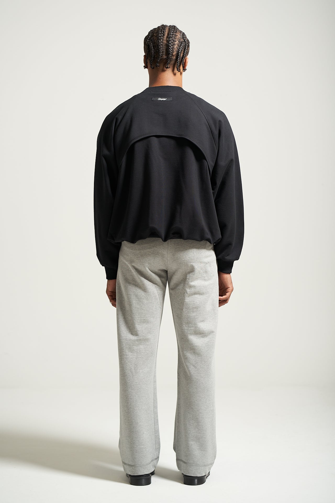 The Black Raglan Crewneck