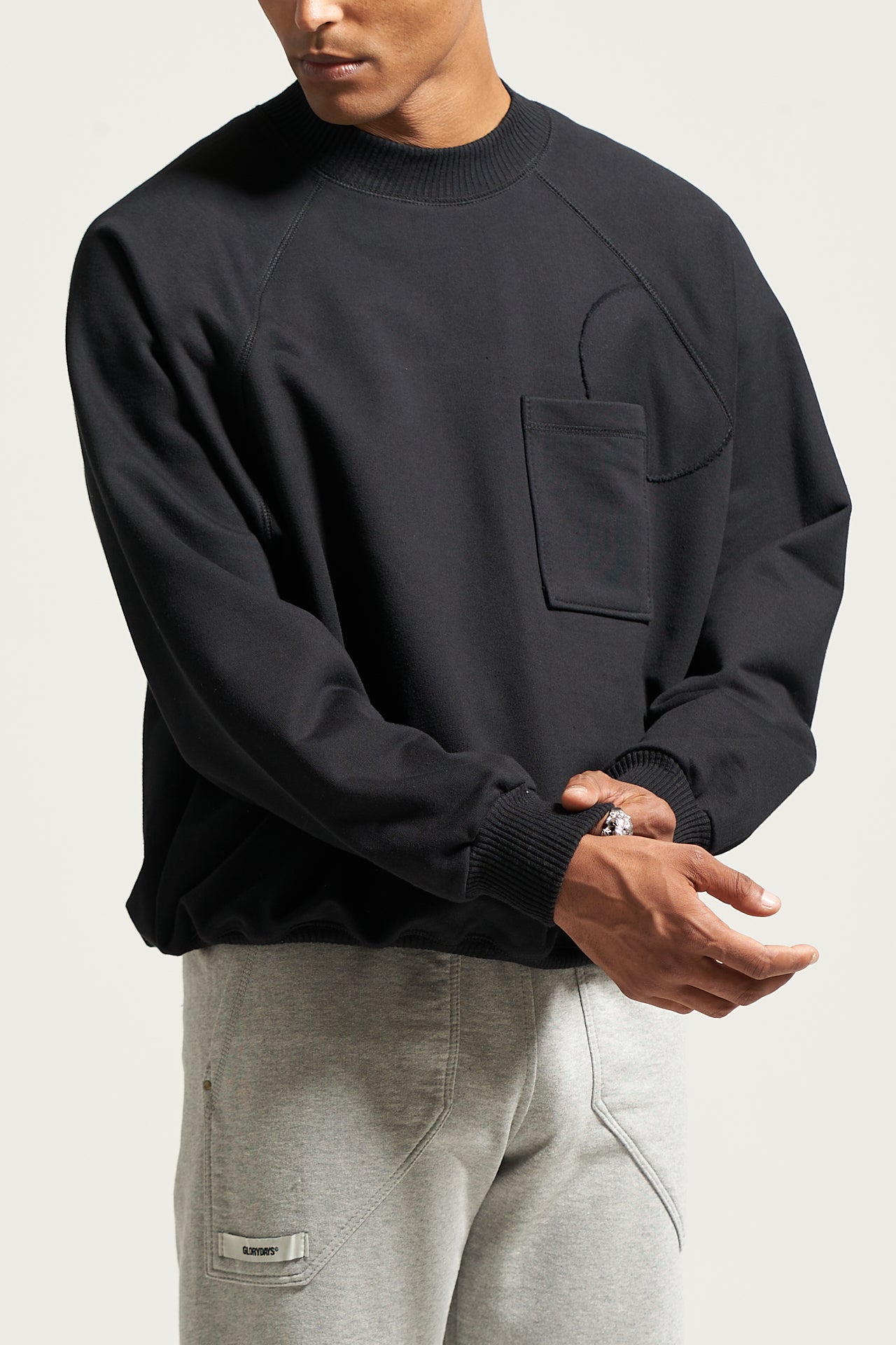 The Black Raglan Crewneck