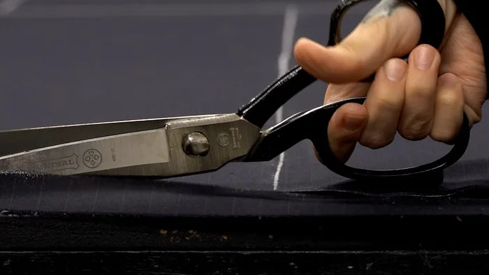 Pinstripe wool being cut by hand in the Glorydays studio