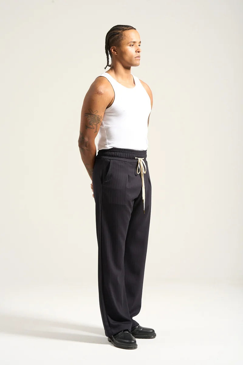 The Pinstripe Flow Pant: relaxed straight fit and adjustable waist